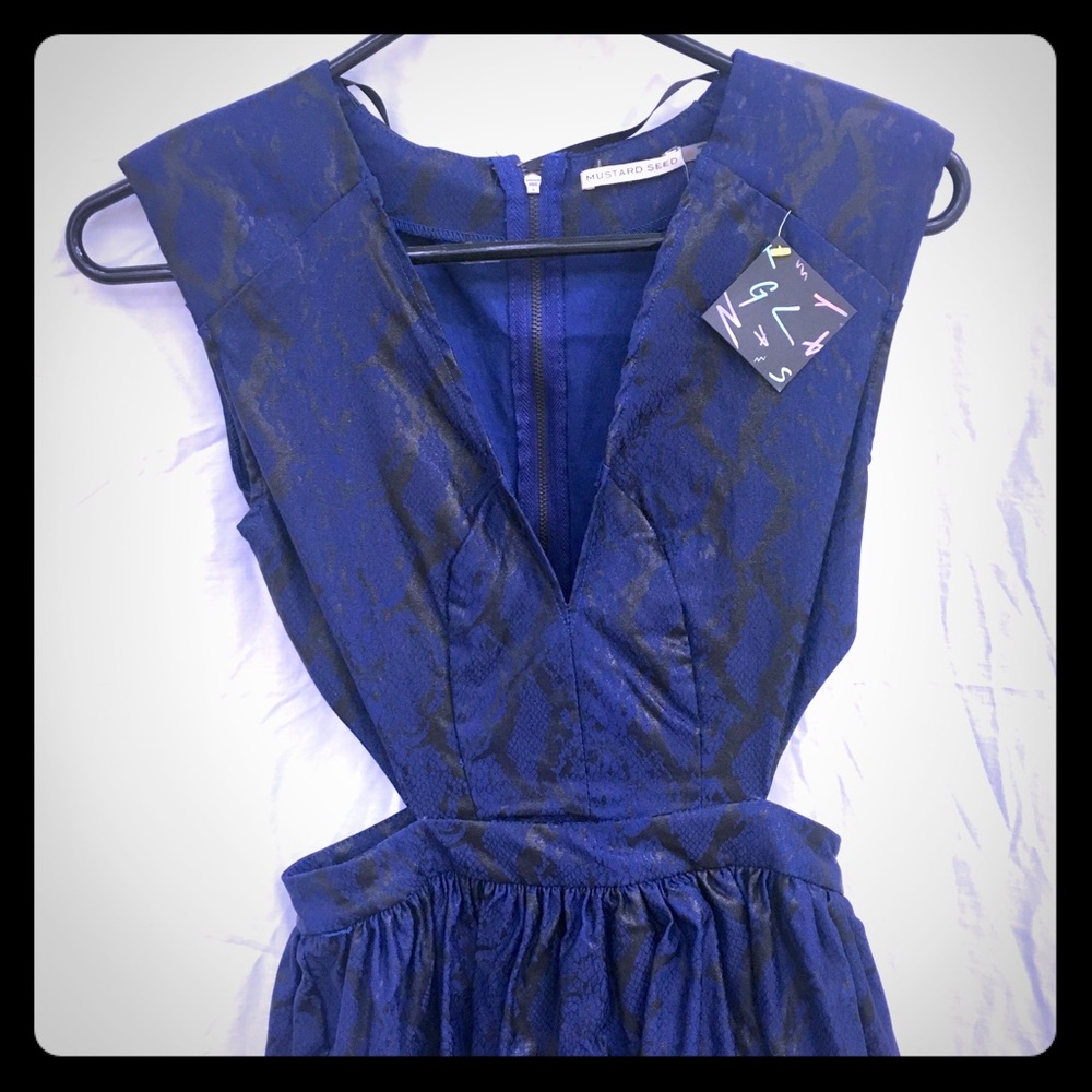 NWT Nasty Gal Dress with deep V and side cut outs